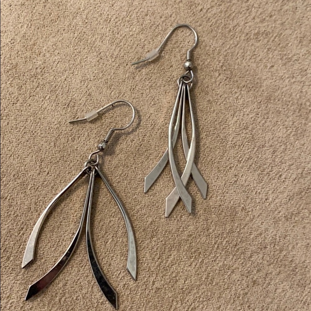 Silver dangle he earrings. Super Cute!